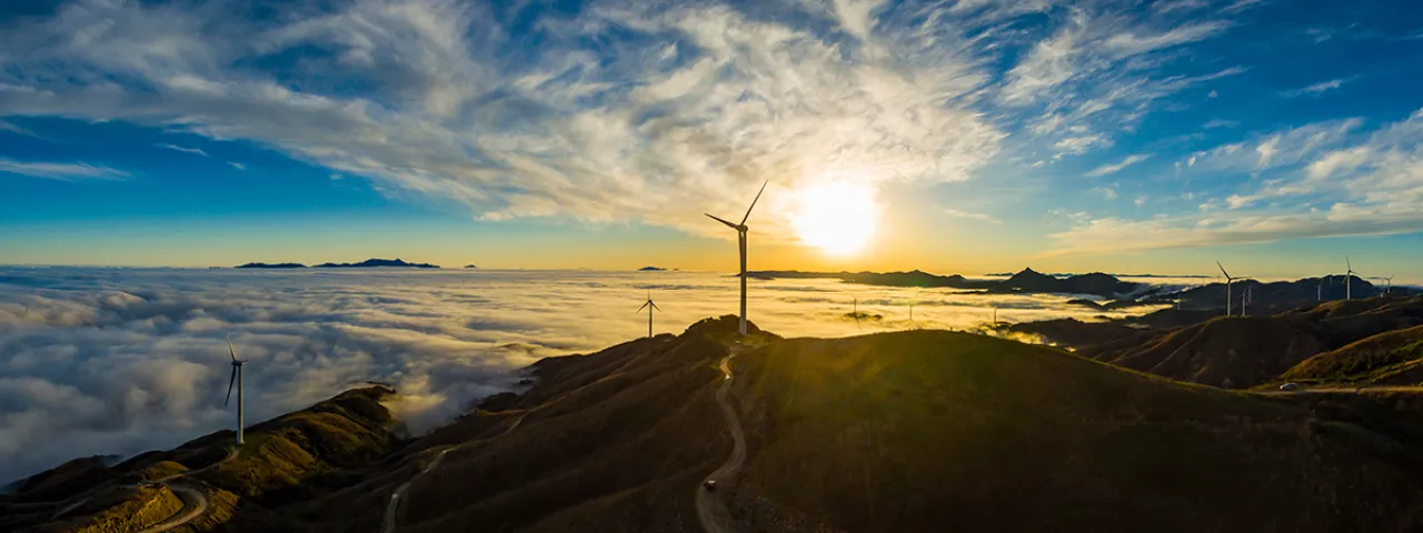 Wind turbines over vast landscape