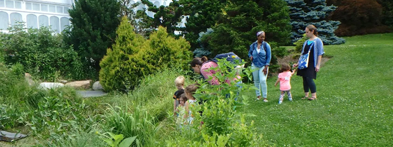 Group of Fort Hill children outside the Smith conservatory