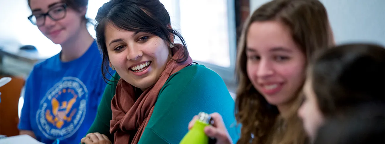 Students smiling in classroom