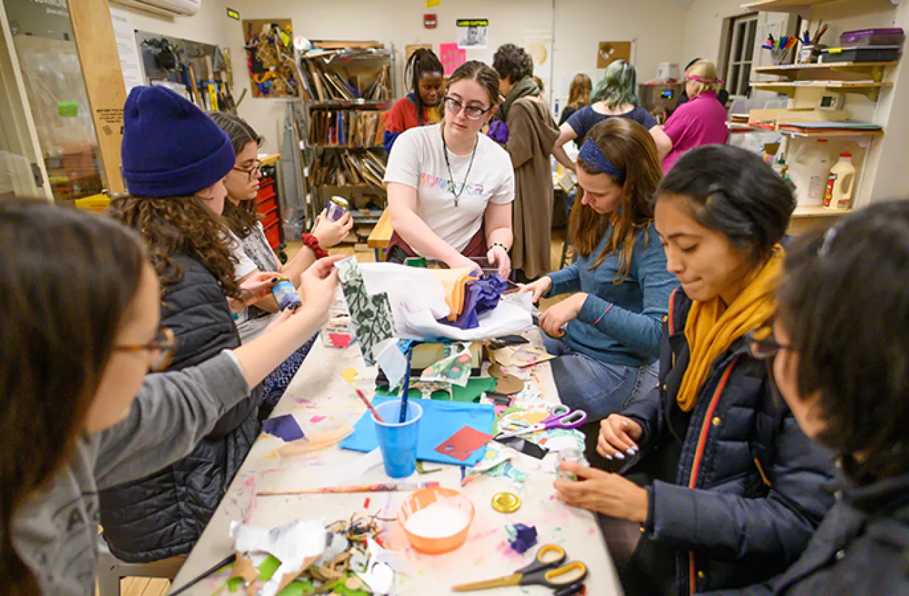 A group of students working on various projects