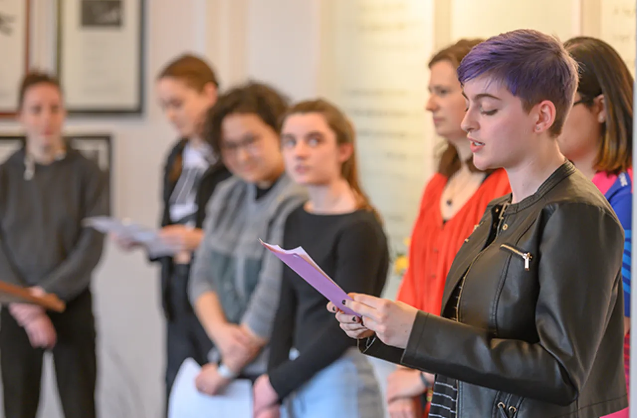 Image of students reading poetry