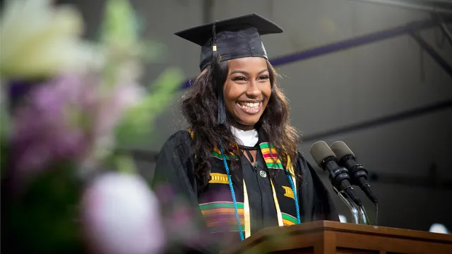 Aminata Khan speaking at Commencement