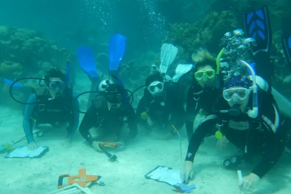 five scuba divers