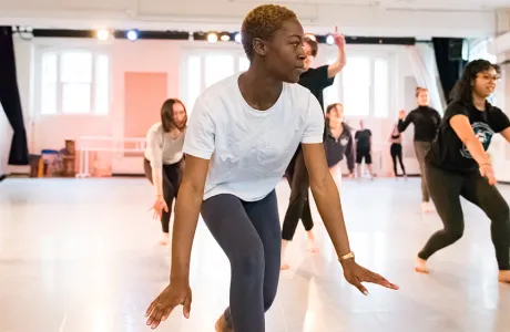 A group of dancers rehearse in Scott Dance Studio