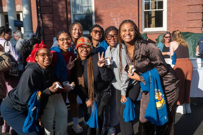 Students smile in a group on Mountain Day 2023