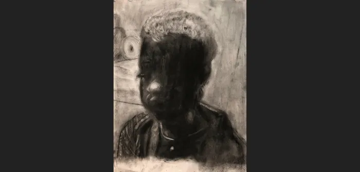 Charcoal drawing of a little boy by Fay Adan '21