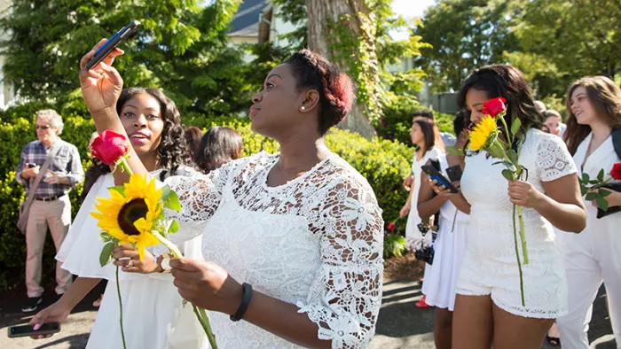 Students marching in the Ivy Day parade