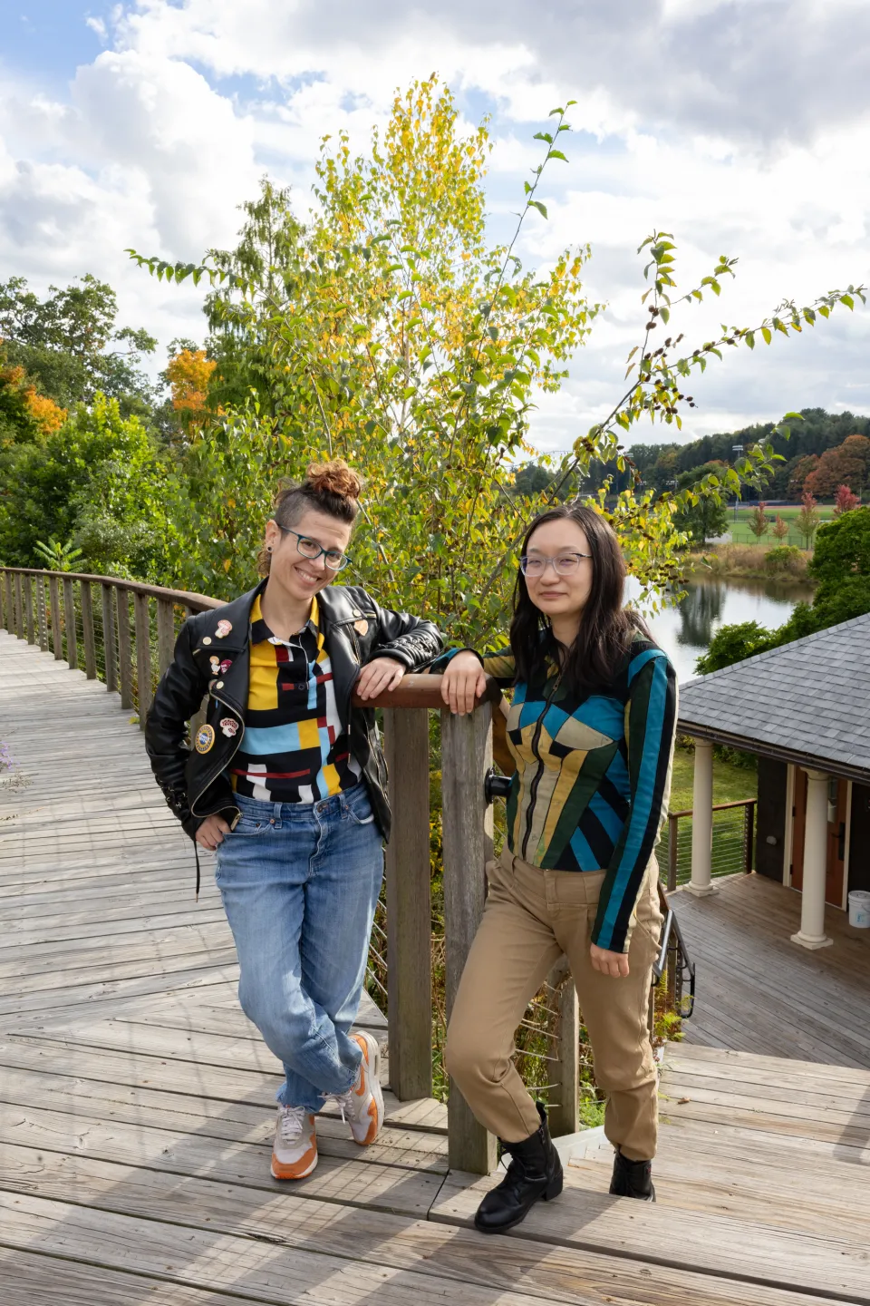 Heather Rosenfeld and Shiya Cao stand on a ramp near the Paradise Pond boathouse