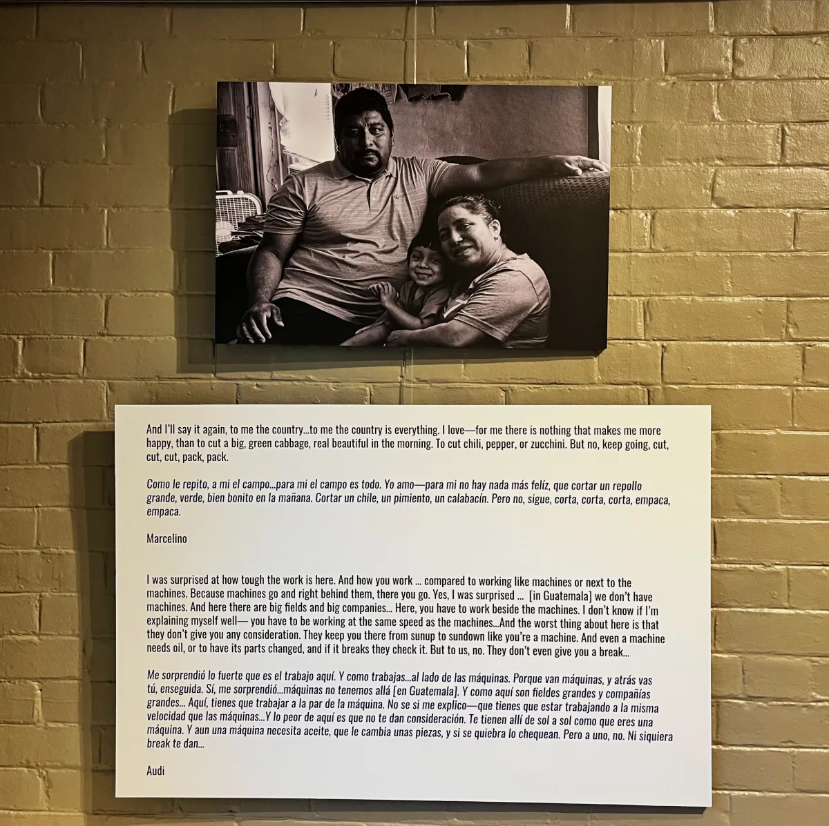 Black and white photo of couple with text panel beneath it