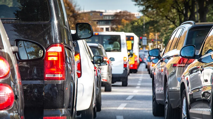 Two lanes of cars as seen from behind