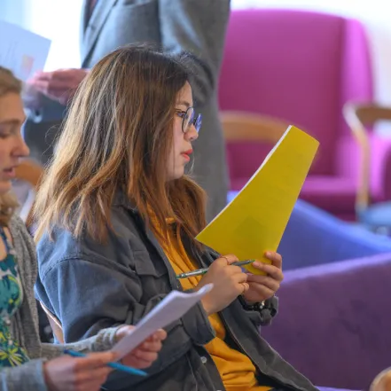 Two students in the Poetry Center